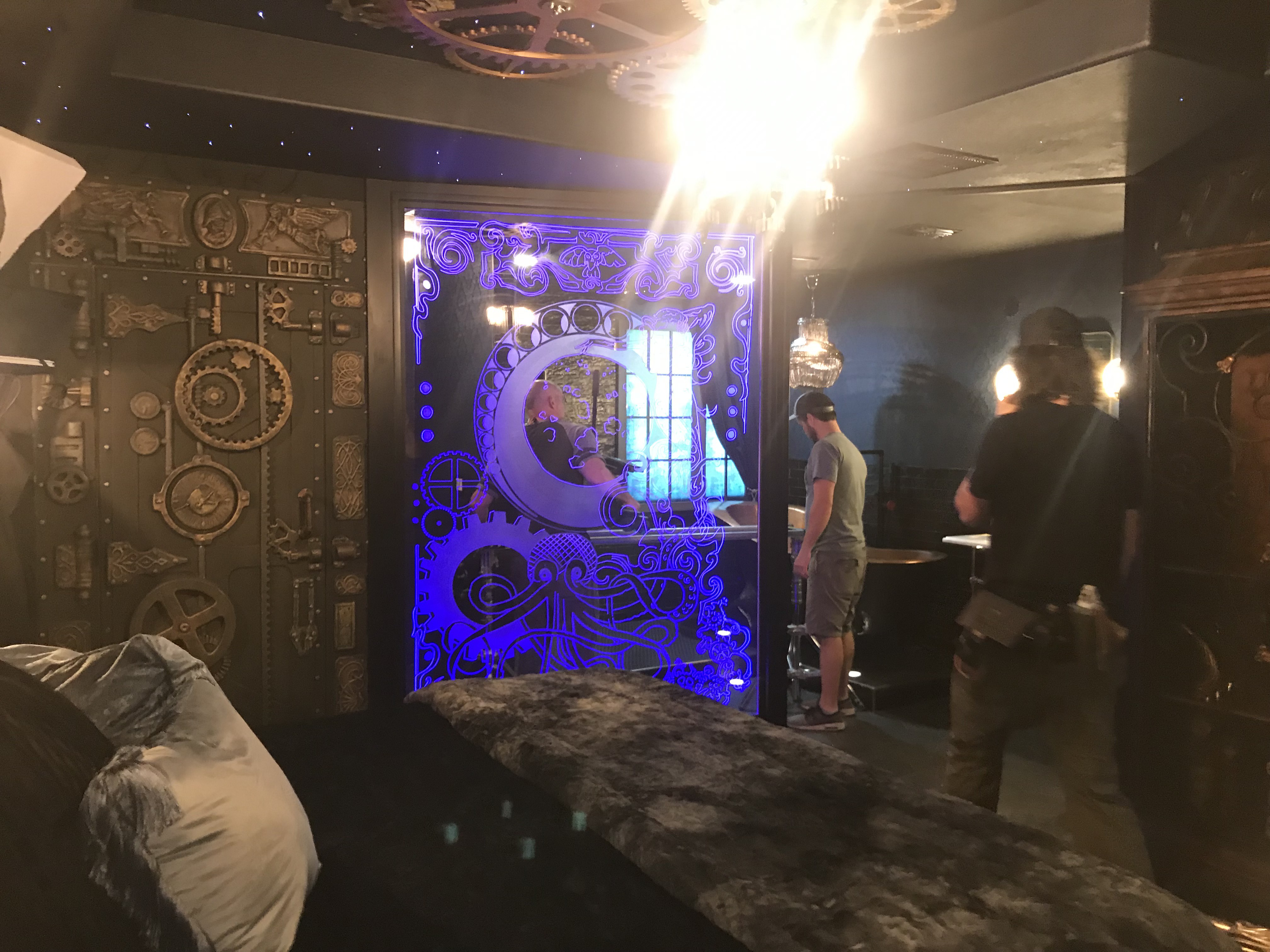 Spectacular Steampunk — gear wall and blue glass panel, behind the scenes