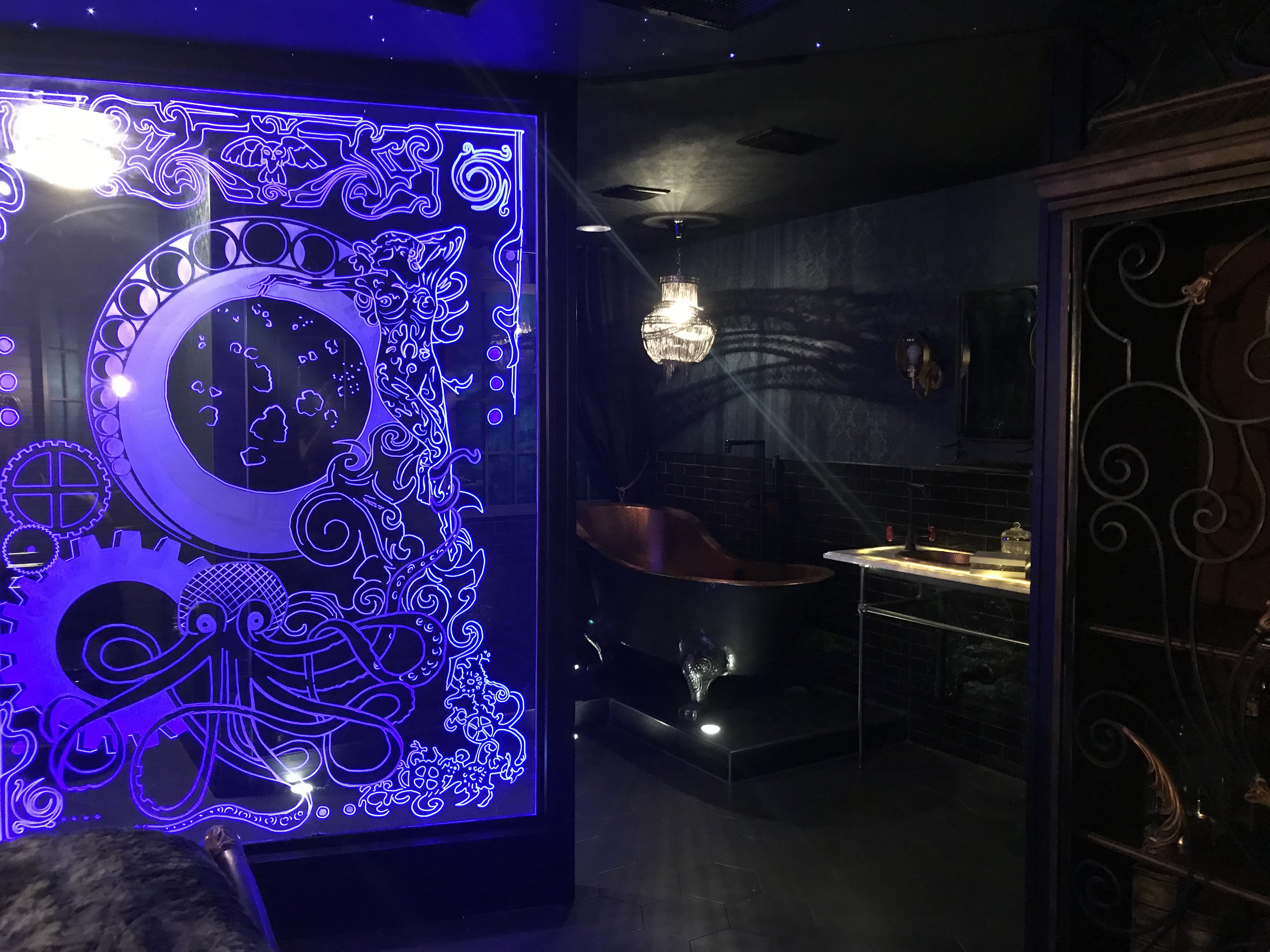 Spectacular Steampunk — blue-lit etched glass panel with gears and crescent moon